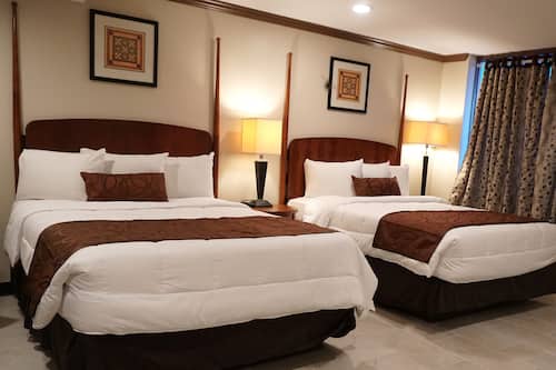 Junior Suite, 2 Bedrooms, Non Smoking, Pool View | Iron/ironing board, free WiFi, bed sheets