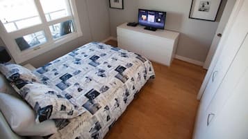 Condo, 2 Bedrooms (Uptown 2BLD) | 2 bedrooms, pillowtop beds, cribs/infant beds, free WiFi