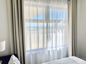 Apartment, 1 Bedroom, Ocean View | Iron/ironing board, cribs/infant beds, rollaway beds, free WiFi