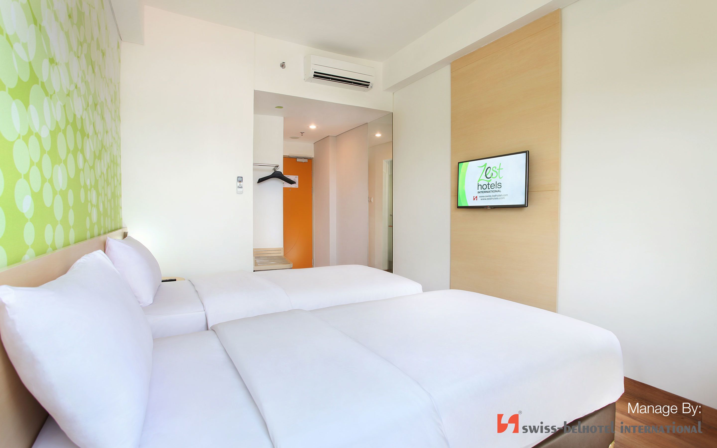 zest twin room | in-room safe, desk, laptop workspace, blackout curtains