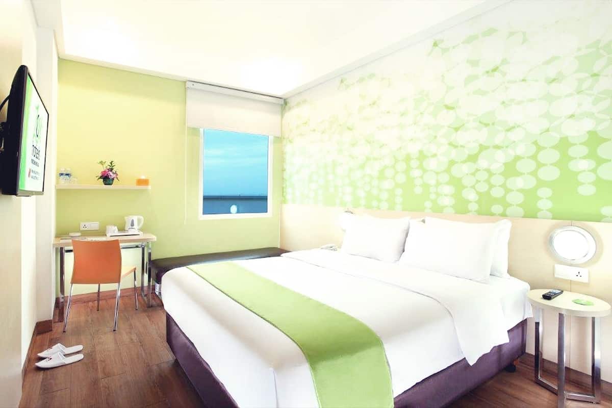 deluxe room, pool access | in-room safe, desk, laptop workspace, blackout curtains