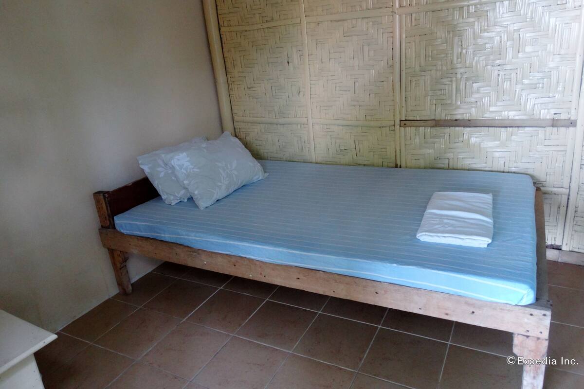 Non-Aircon Room (with Electric fan, Common Bathroom)