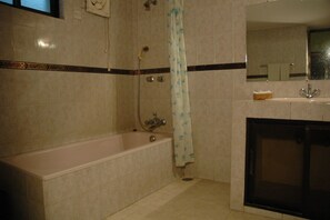 Bathroom | Shower, free toiletries, towels - Hotel Center Point (Dhaka)
