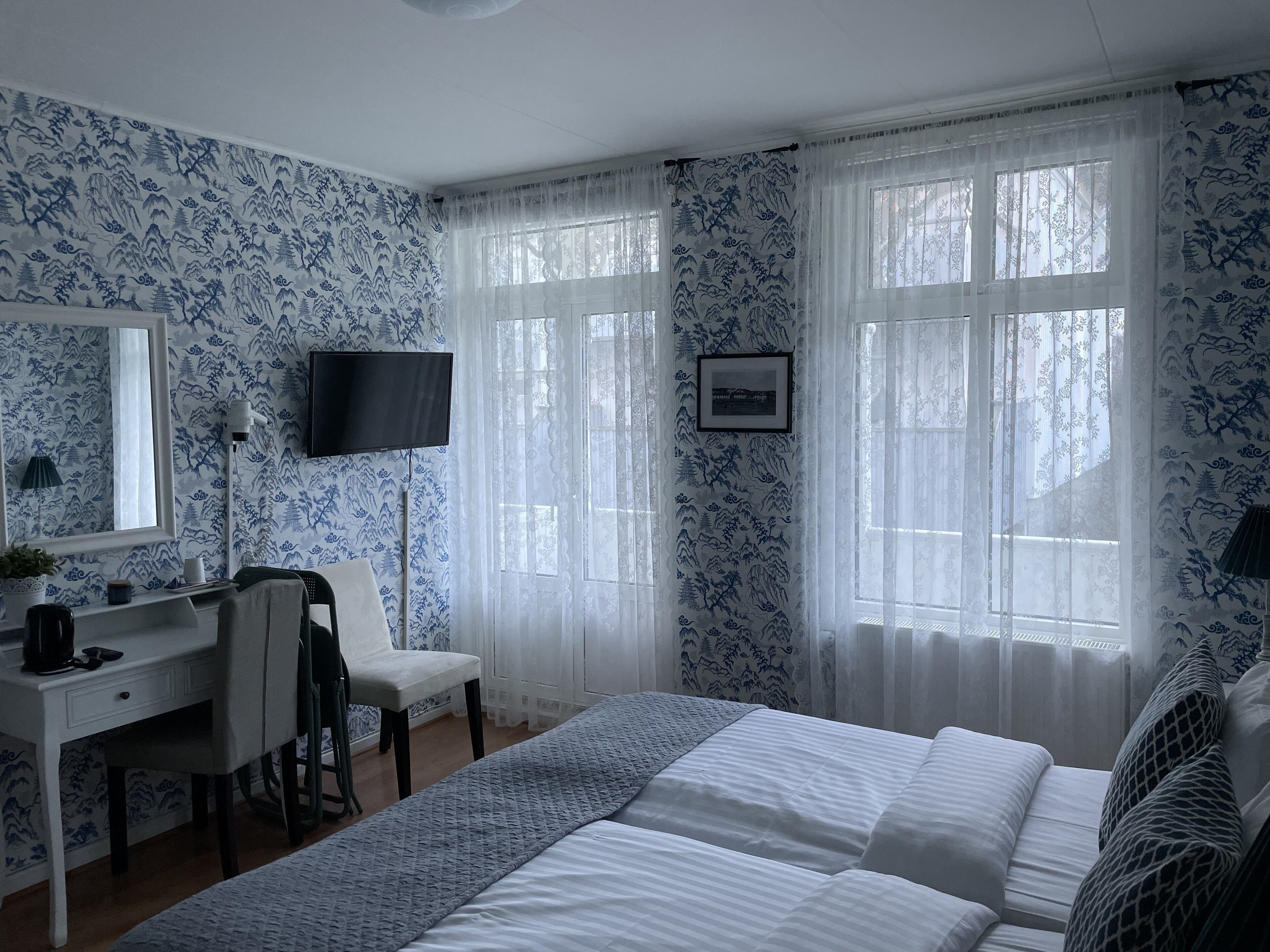 double or twin room | premium bedding, desk, blackout curtains, iron/ironing board