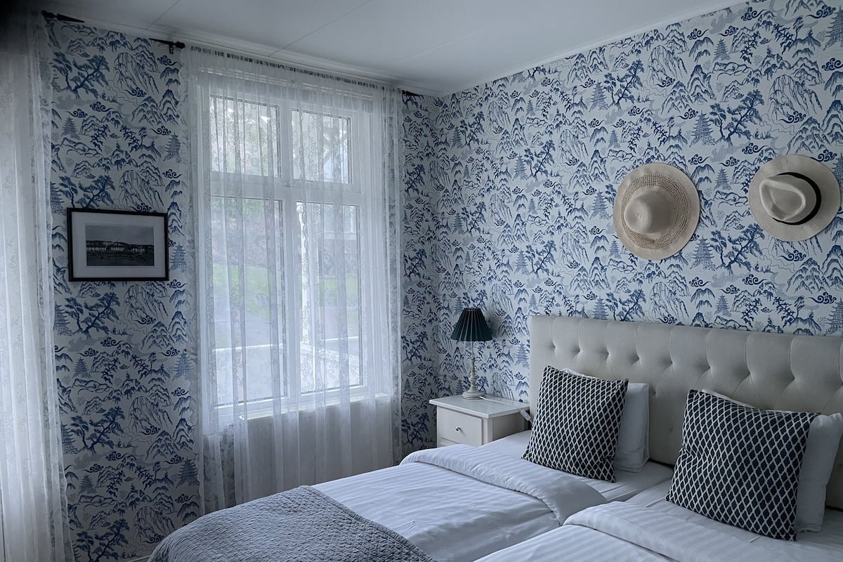 Small Double Room | Premium bedding, desk, blackout drapes, iron/ironing board