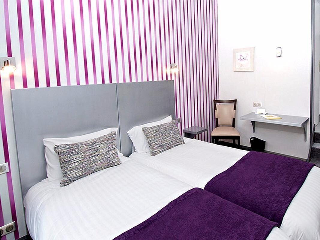 Habitación Confort con 2 camas individuales | Escritorio, sistema de insonorización, cunas gratuitas y wifi gratis