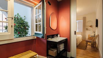 Classic Double or Twin Room | Minibar, in-room safe, desk, iron/ironing board