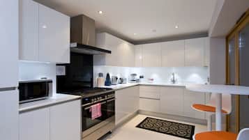 Chambre Deluxe, 3 chambres | Cuisine privée
