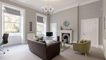 Classic Apartment, 1 Bedroom | Living area | 50-inch flat-screen TV with cable channels, TV