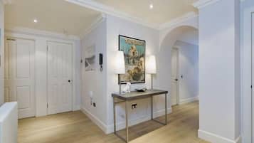 Deluxe Room, 3 Bedrooms | 1 bedroom, desk, iron/ironing board, travel crib