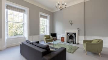 Classic Apartment, 2 Bedrooms | Living area | Flat-screen TV, iPod dock