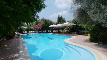 Outdoor pool, open 8:00 AM to 8:00 PM, pool umbrellas, sun loungers