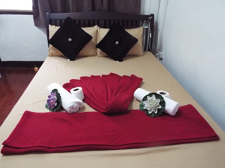 Economy Double Room, 1 Queen Bed | 2 bedrooms, desk, laptop workspace, free WiFi