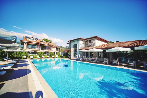 Indoor pool, outdoor pool, pool umbrellas, sun loungers