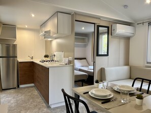 Superior MobilHome | Living area | Ping pong - Camping Village Mugello Verde (Scarperia e San Piero)