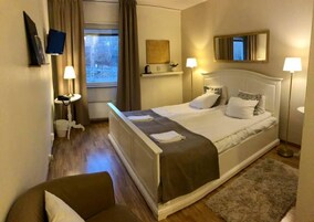 Individually decorated, blackout curtains, iron/ironing board