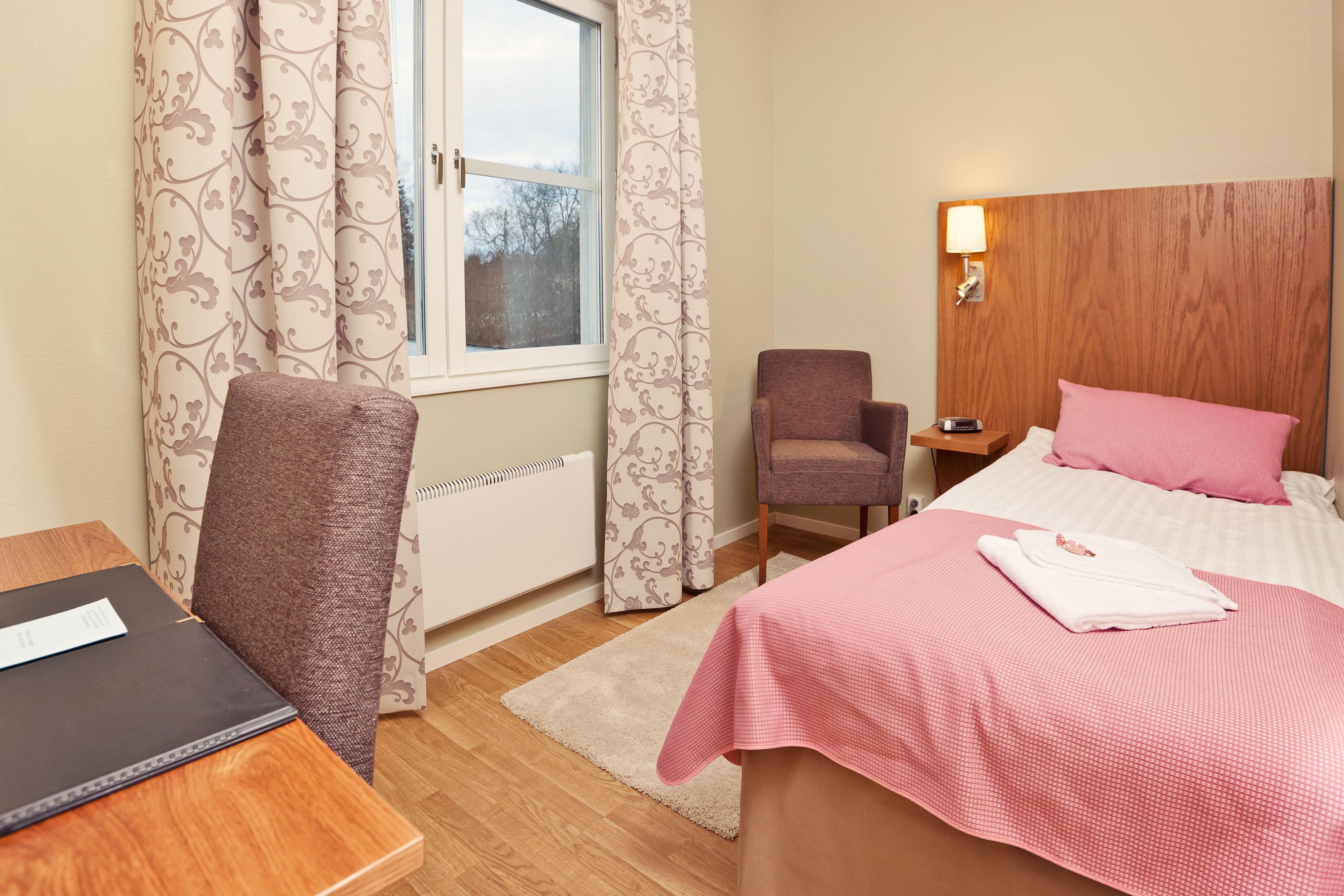 single room | individually decorated, blackout curtains, iron/ironing board