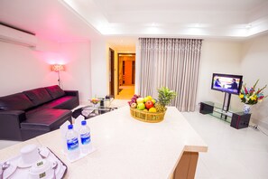 32-inch flat-screen TV with cable channels, TV