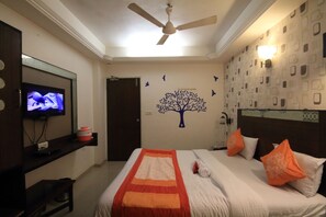 Chambre Deluxe, 1 chambre (Ac Room) | Literie de qualité supérieure, bureau, lits pliants/supplémentaires