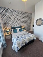 Economy Double Room | Iron/ironing board, bed sheets