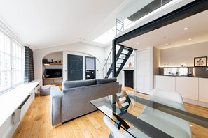 North Bridge Lofts, luxury studio | Living area | 45-inch flat-screen TV with digital channels, LED TV, iPod dock