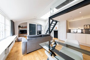 North Bridge Lofts, luxury studio | Living area | 45-inch flat-screen TV with digital channels, LED TV, iPod dock