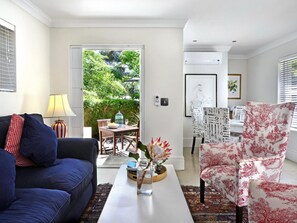 Lavender Cottage (2) | Living area | 40-inch flat-screen TV with satellite channels, LCD TV, MP3 dock