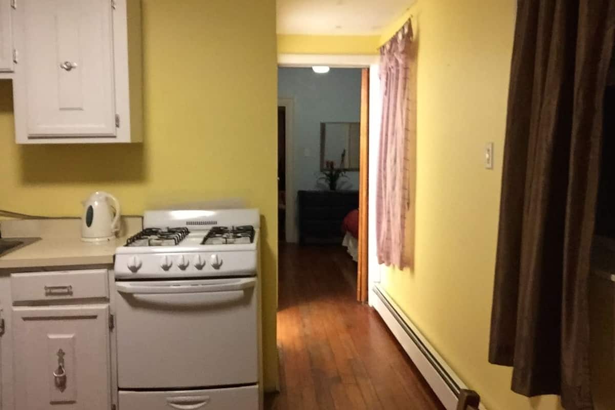 Traditional Apartment, 1 Bedroom, Kitchen, Garden Area | Private kitchen | Coffee/tea maker, full-size fridge, microwave, cookware/dishes/utensils