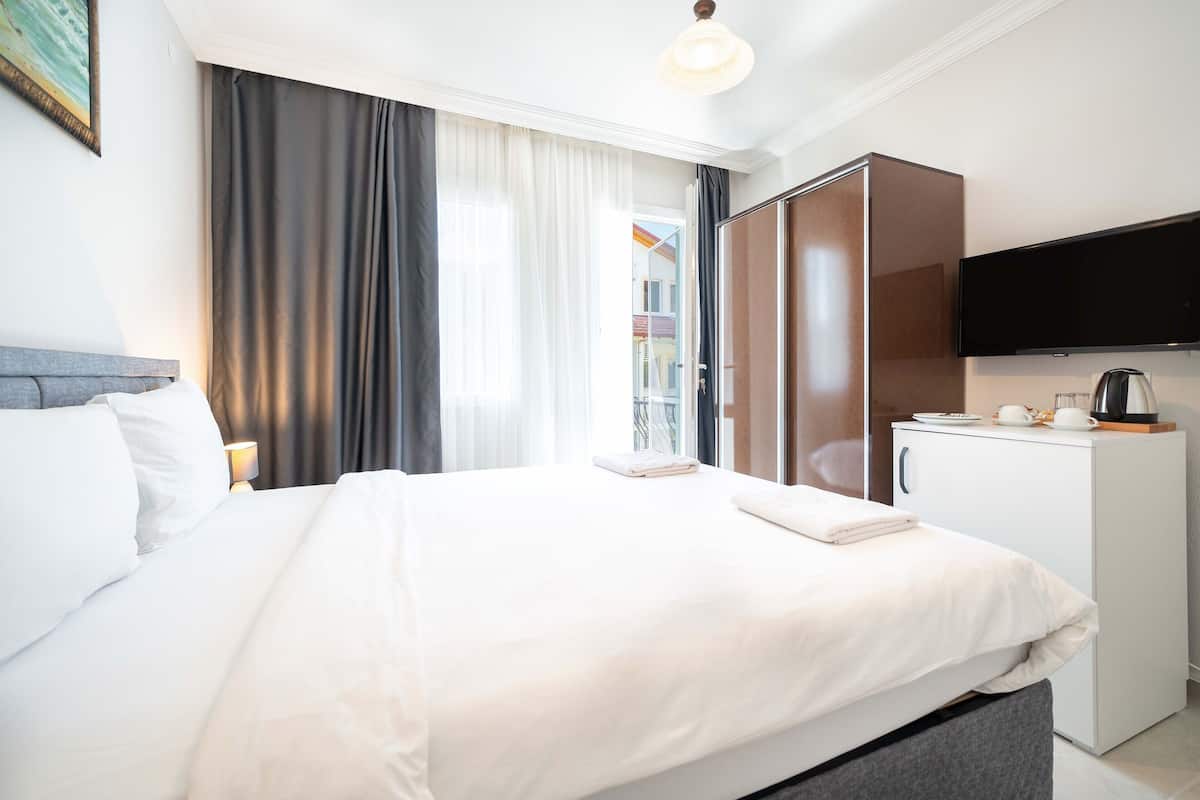 Deluxe Room | 高級寢具、迷你吧、書桌、免費無線上網