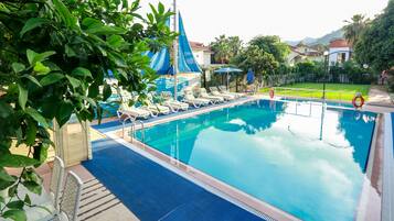 Seasonal outdoor pool, open 7:00 AM to 8:00 PM, pool umbrellas