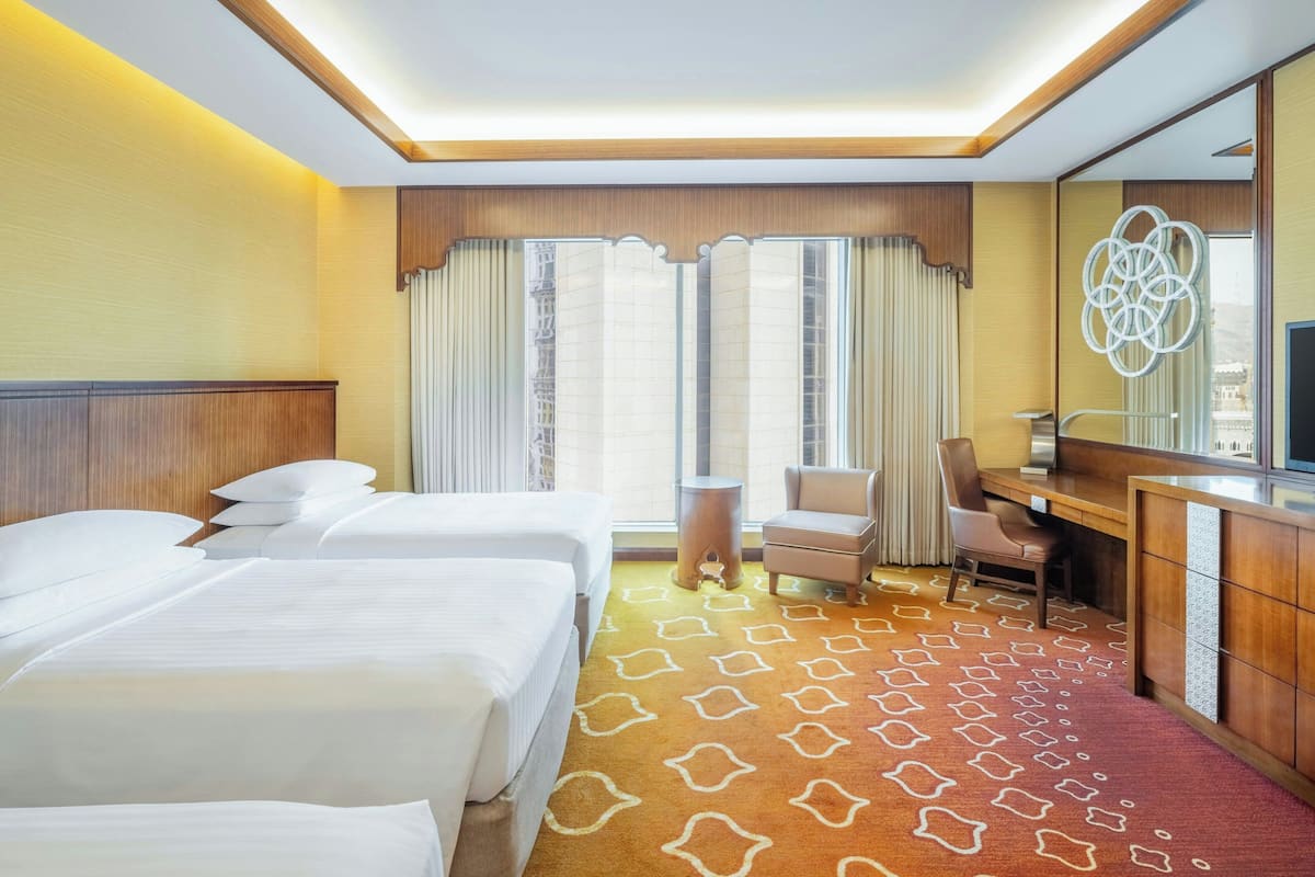 Luxe beddengoed, een minibar, een kluis op de kamer, een bureau