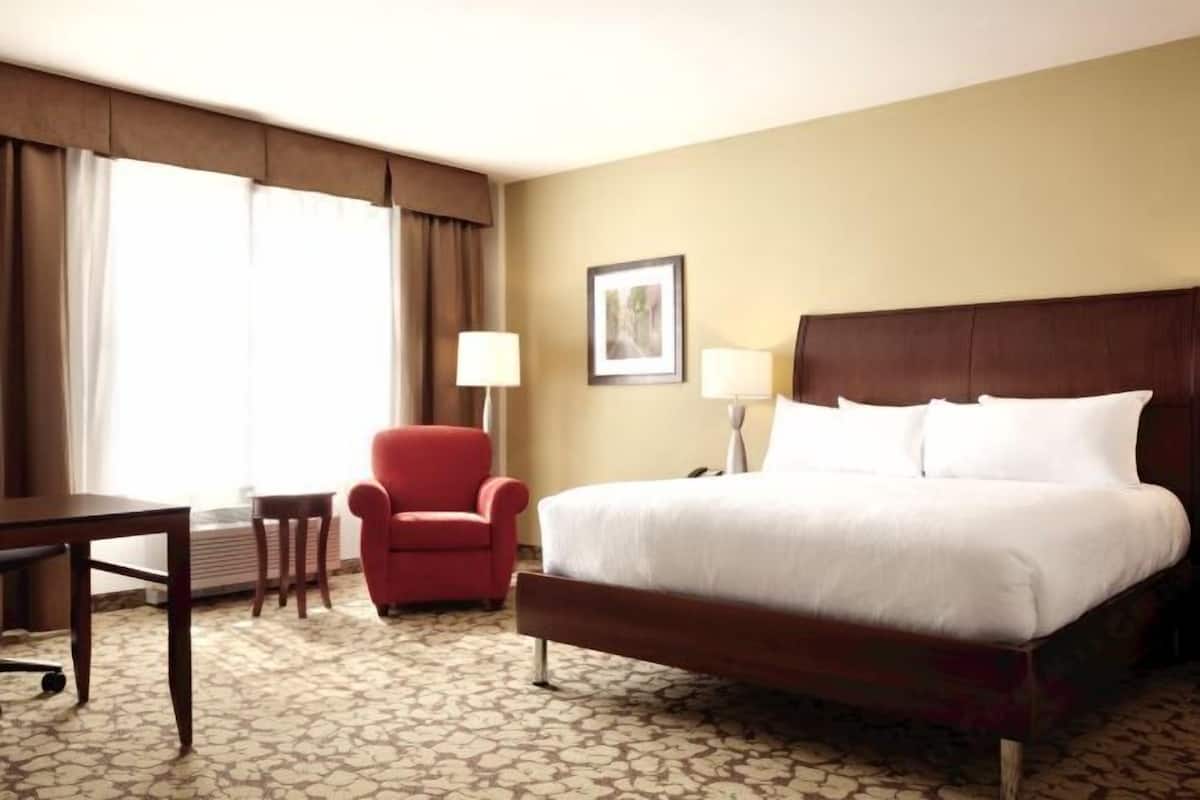 Desk, laptop workspace, blackout curtains, free WiFi