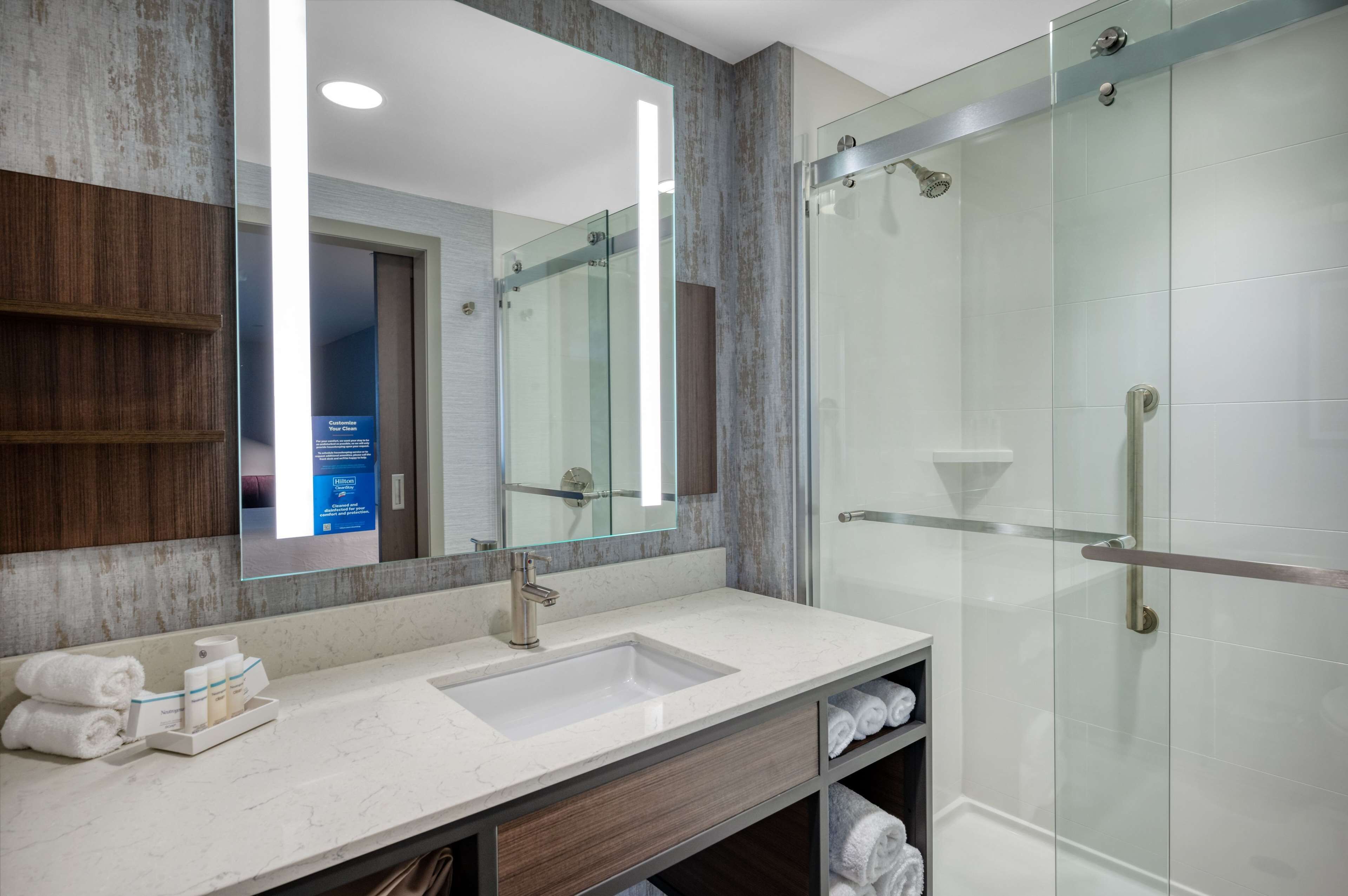 combined shower/bathtub, free toiletries, hair dryer, towels