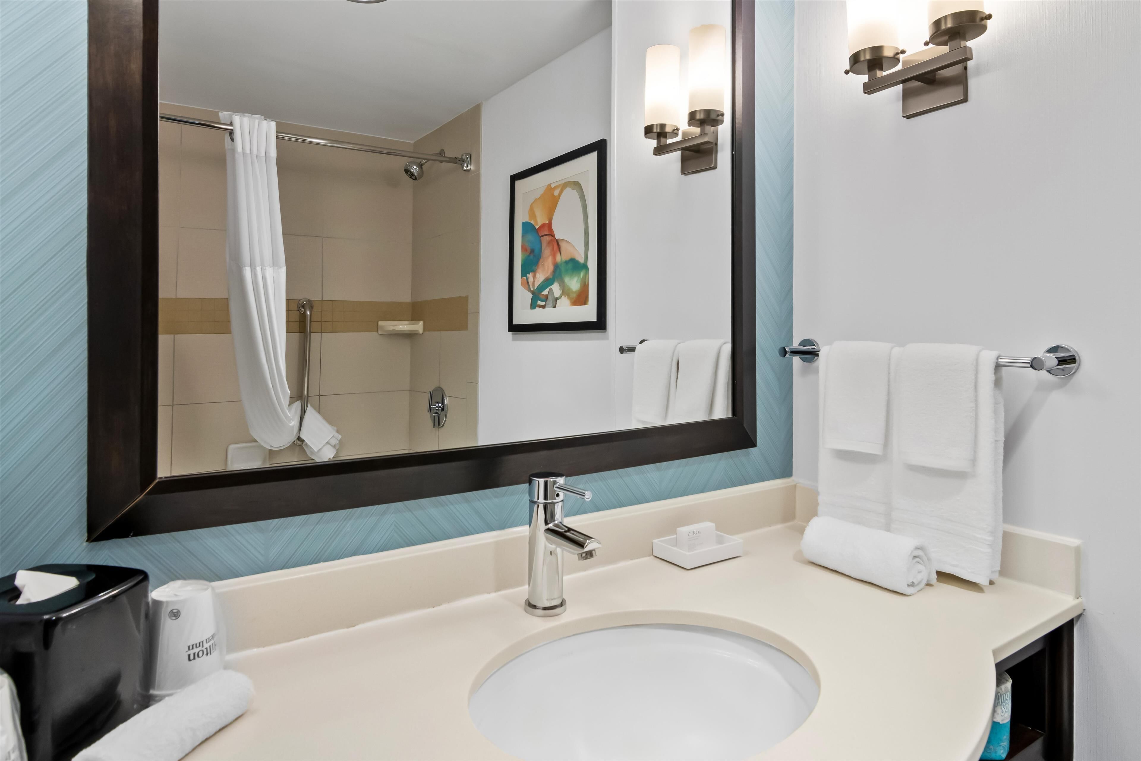 room, 2 queen beds | bathroom | shower, designer toiletries, towels