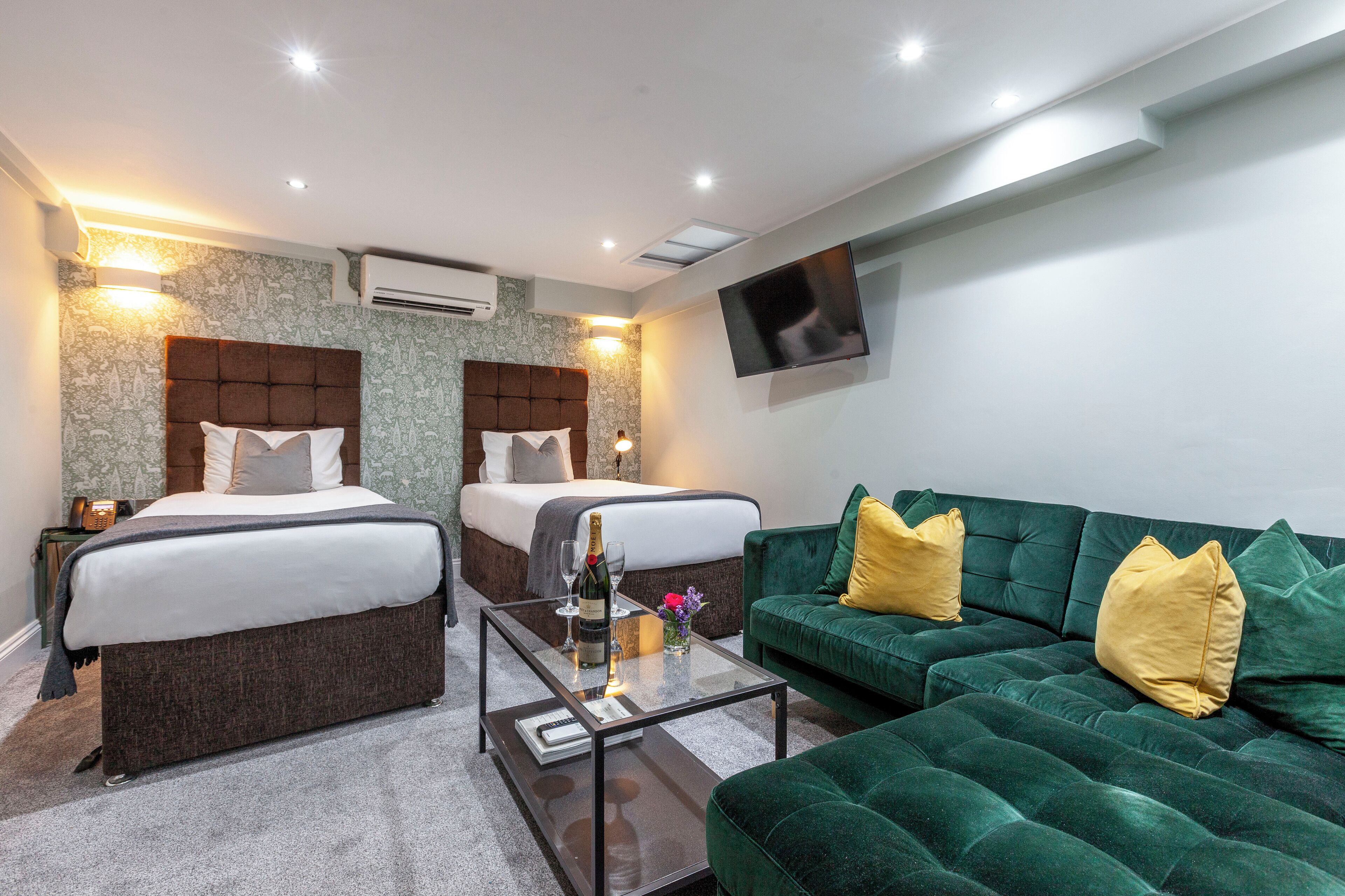 Standard Quadruple Room | Premium bedding, minibar, in-room safe, laptop workspace