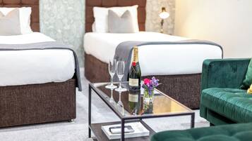 Standard Quadruple Room | Premium bedding, minibar, in-room safe, laptop workspace