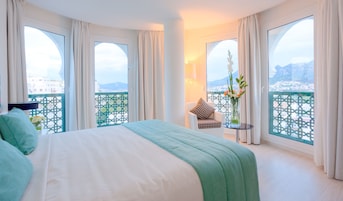 Habitación Deluxe | Ropa de cama de alta calidad, minibar, caja fuerte y escritorio