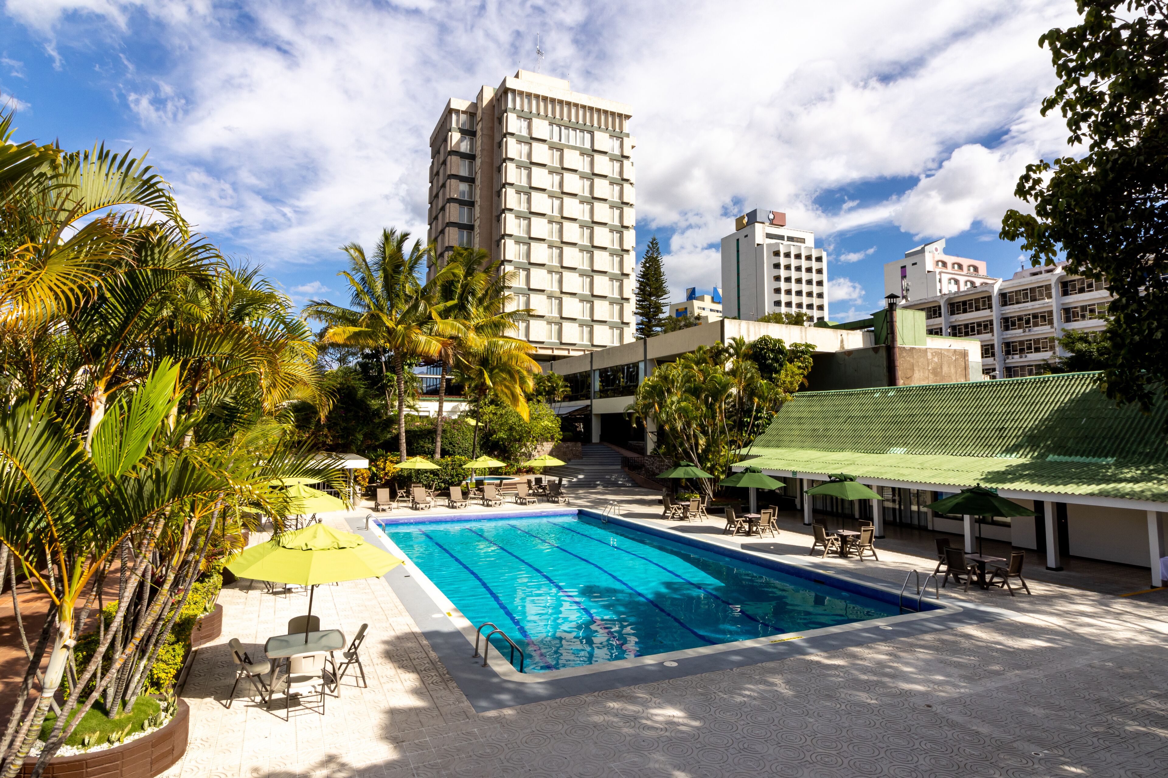 outdoor pool, pool umbrellas, pool loungers
