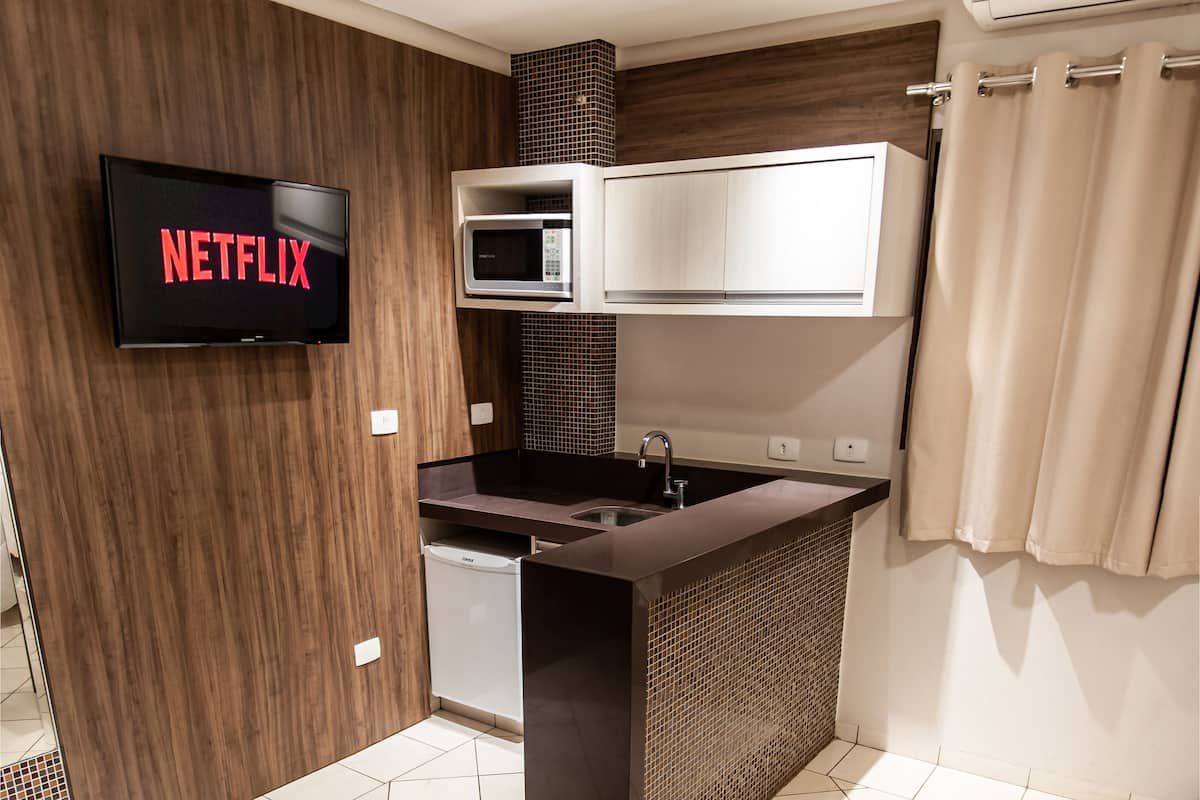 deluxe quadruple room | 1 bedroom, hypo-allergenic bedding, pillow-top beds, minibar