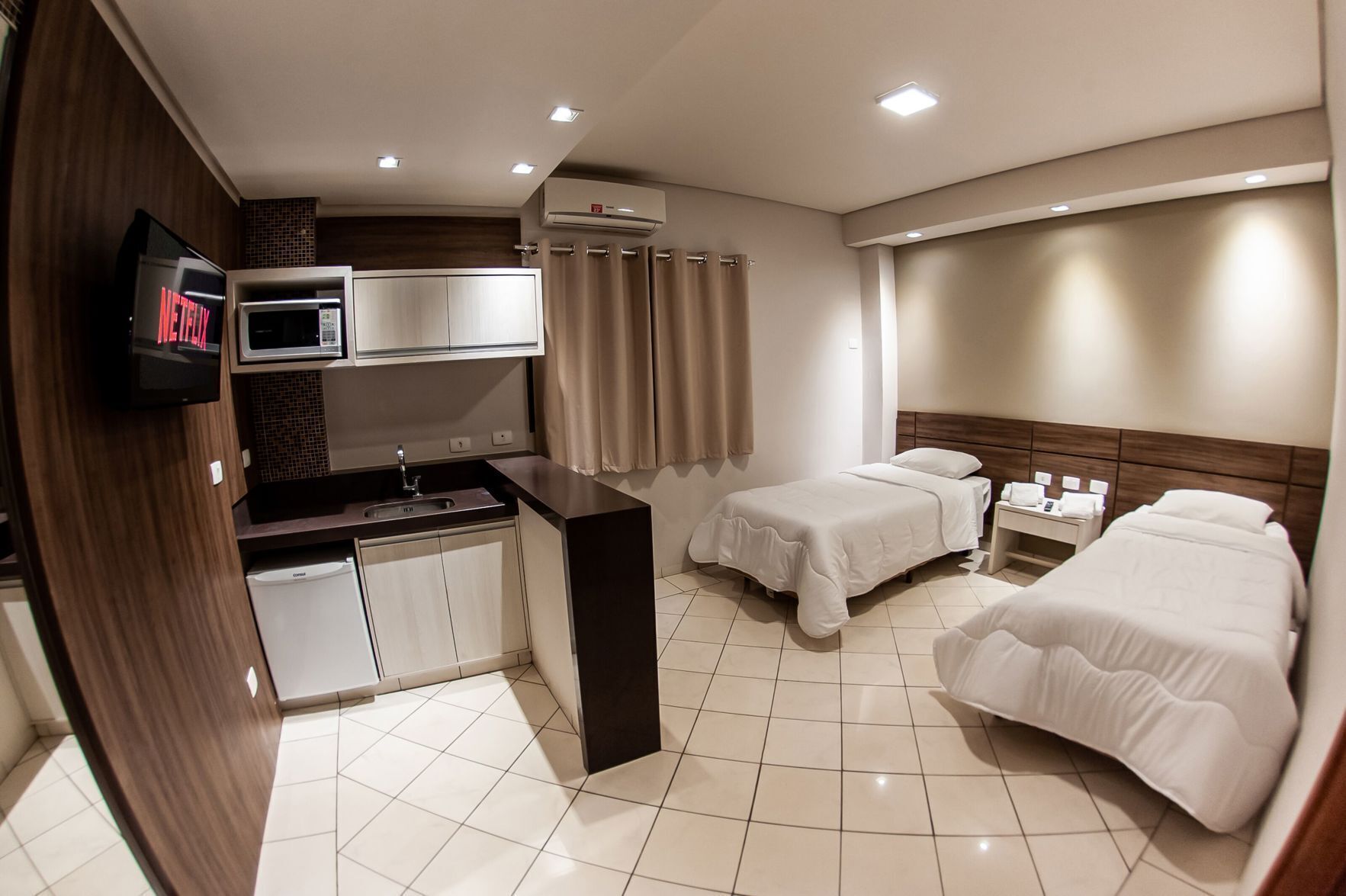 Hypo-allergenic bedding, pillow-top beds, minibar, desk