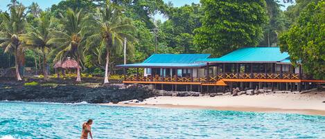 Private beach, white sand, free beach shuttle, beach umbrellas