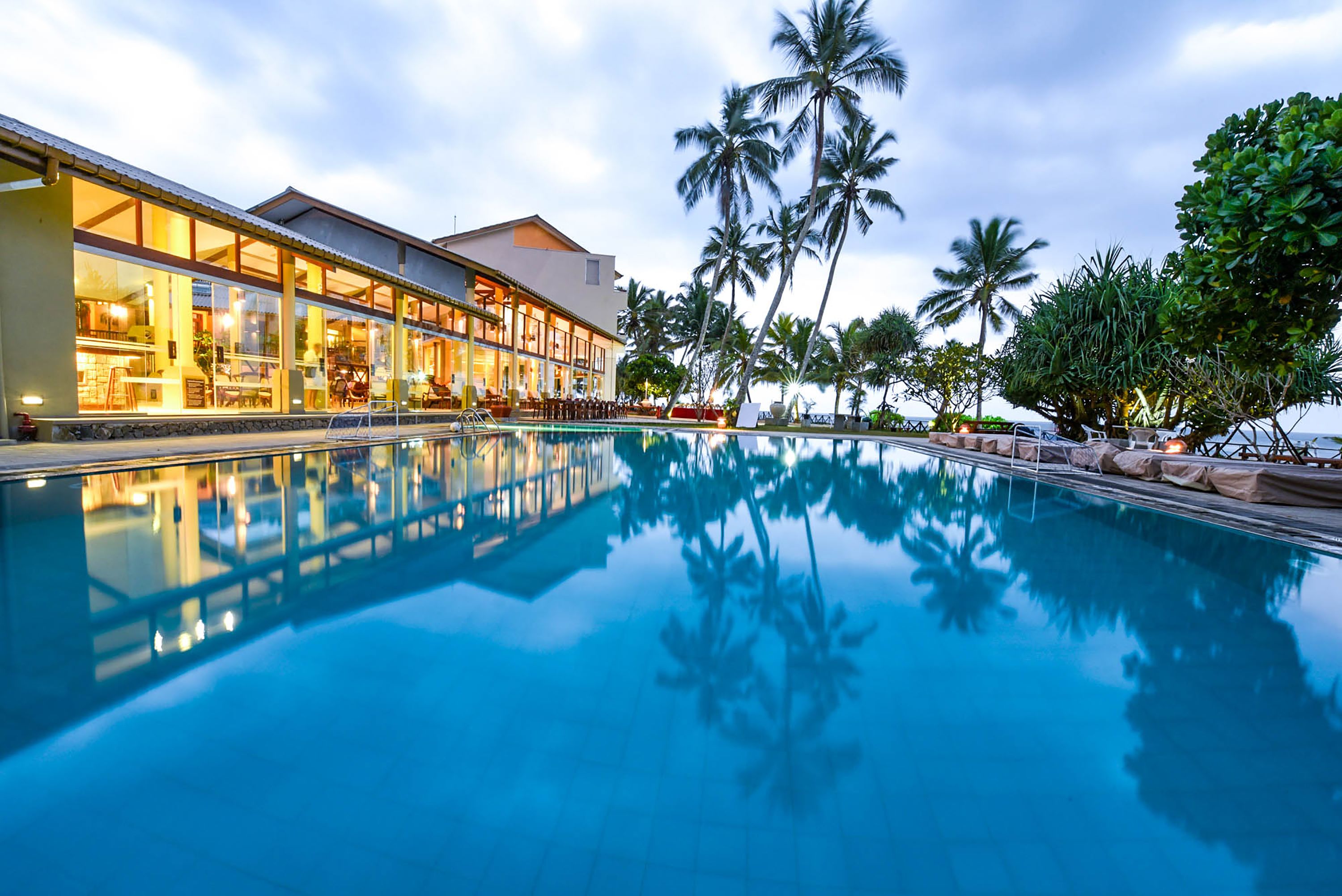 Outdoor pool, pool umbrellas, pool loungers