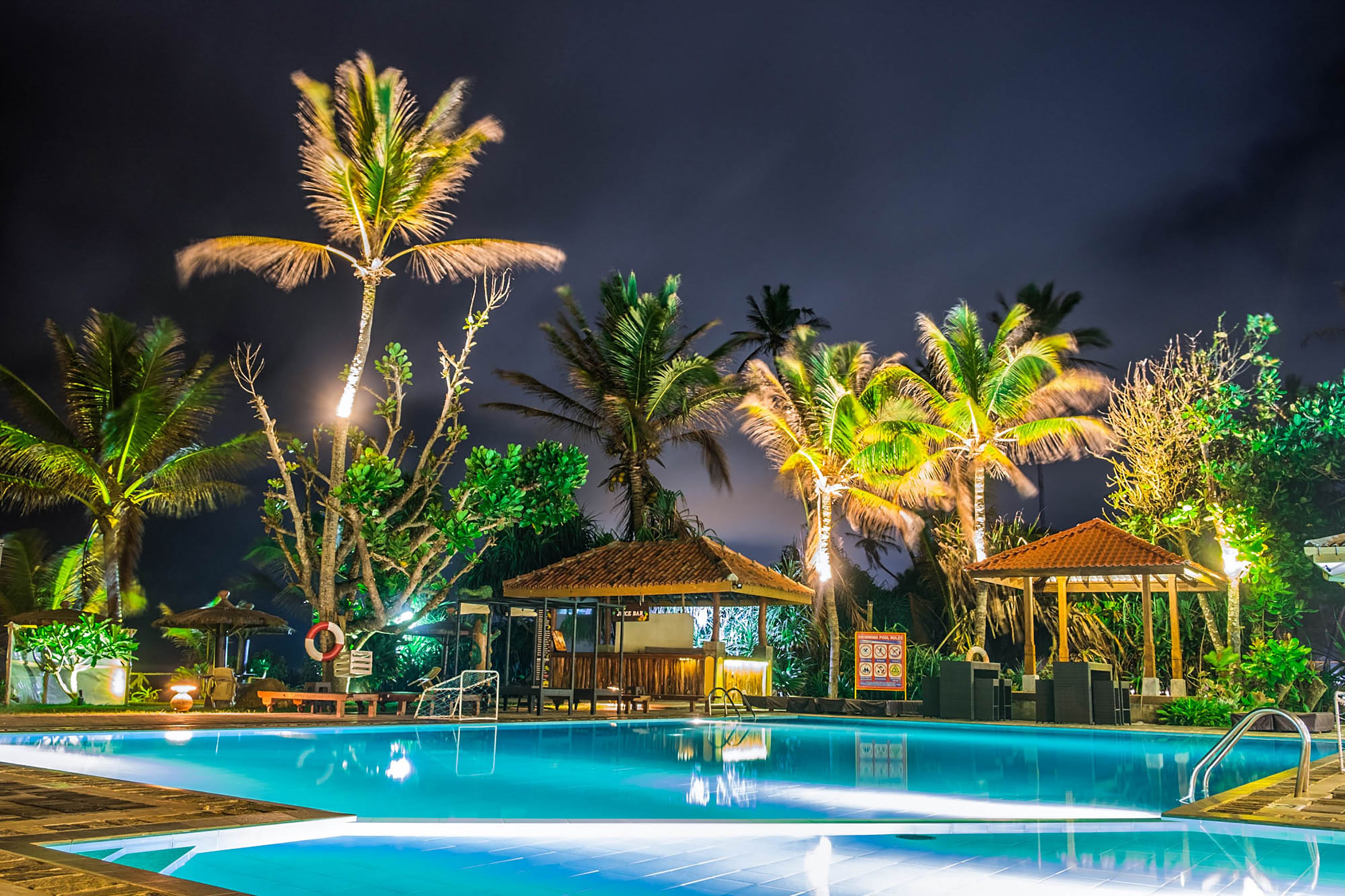 outdoor pool, pool umbrellas, pool loungers