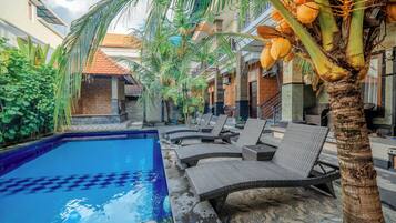 Outdoor pool, sun loungers