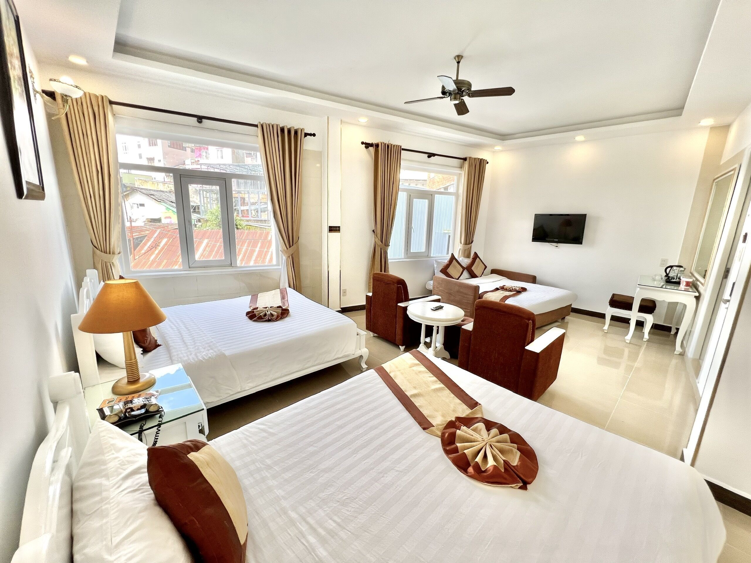 superior family room | minibar, in-room safe, desk, blackout curtains