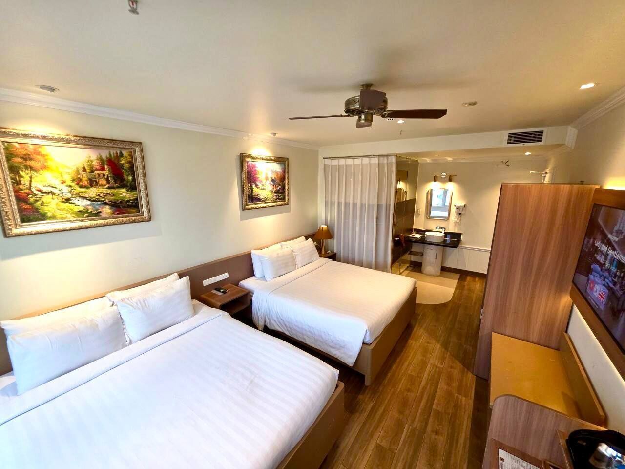 executive quadruple room | minibar, in-room safe, desk, blackout curtains