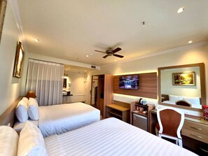 Executive Quadruple Room | Minibar, in-room safe, desk, blackout drapes - Tulip Hotel 2 (Da Lat)