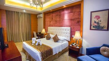 Premium bedding, down duvets, Select Comfort beds, minibar