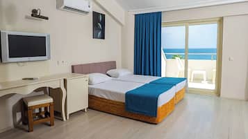 Standard Room | Minibar, in-room safe, desk, iron/ironing board