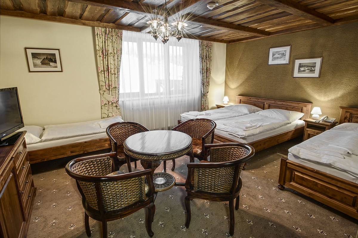 Standard Quadruple Room | 1 bedroom, minibar, in-room safe, desk